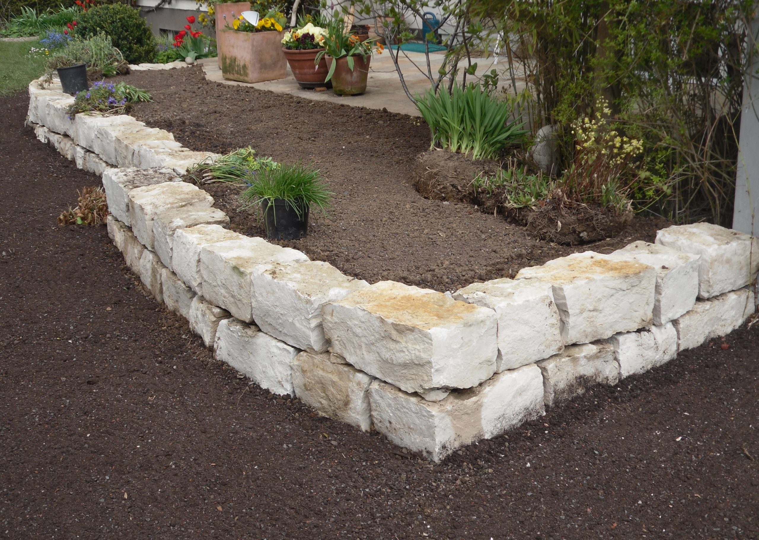 Iljas Gartenbau und Landschaftsbau Neuhausen Natursteinebeet